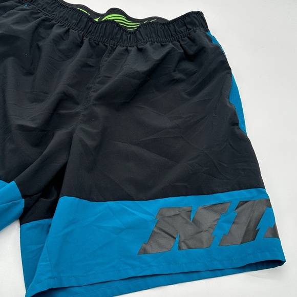 NIKE Sport Clash Logo Training Shorts Medium Black Green Abyss - Picture 3 of 6